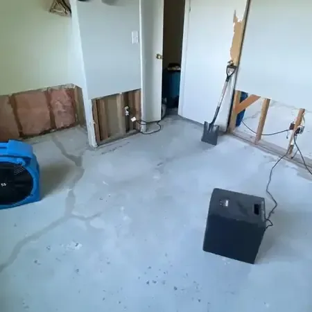 Drying equipment running in a room after water loss, shown for Paramount